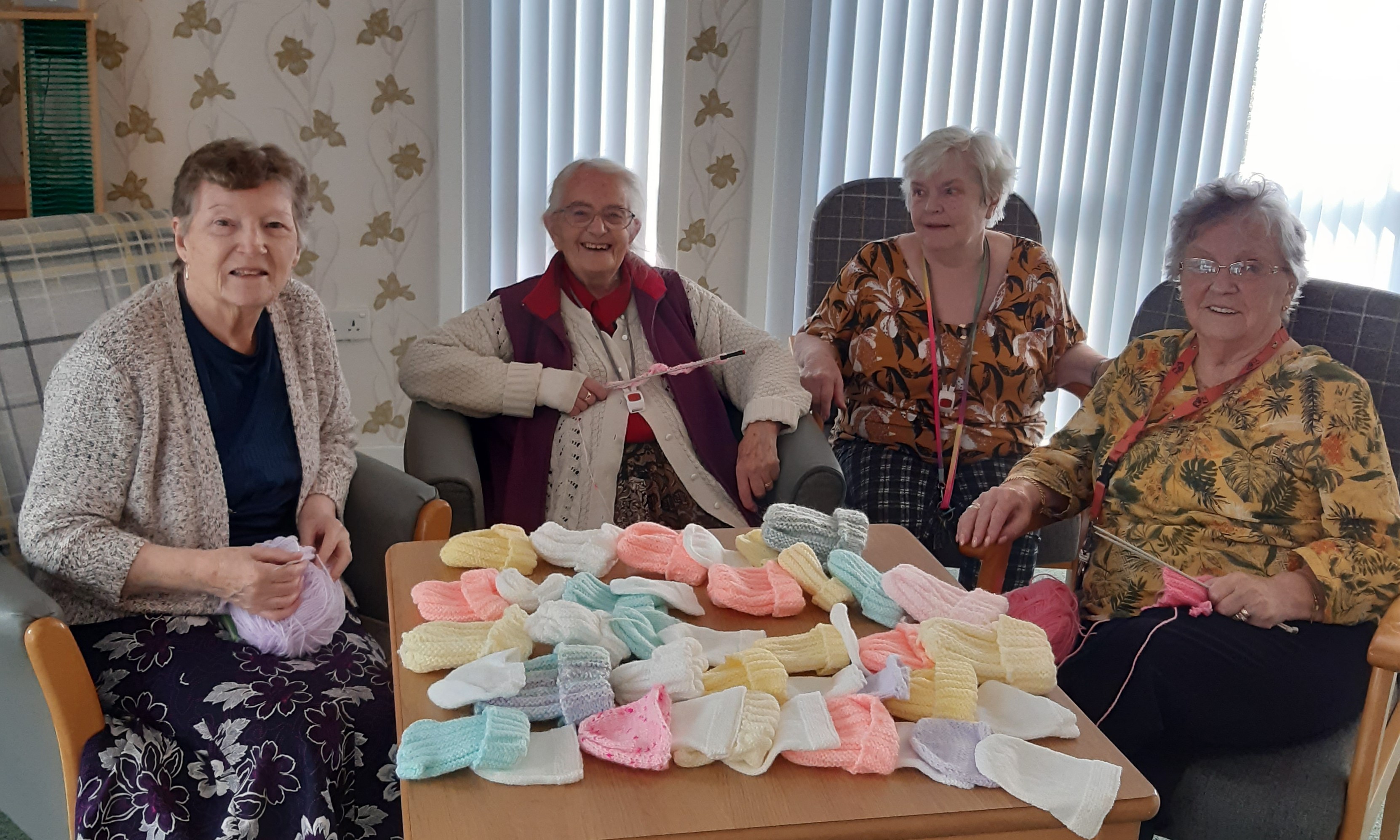 Pensioners at Bield development donate knitted hats to premature babies