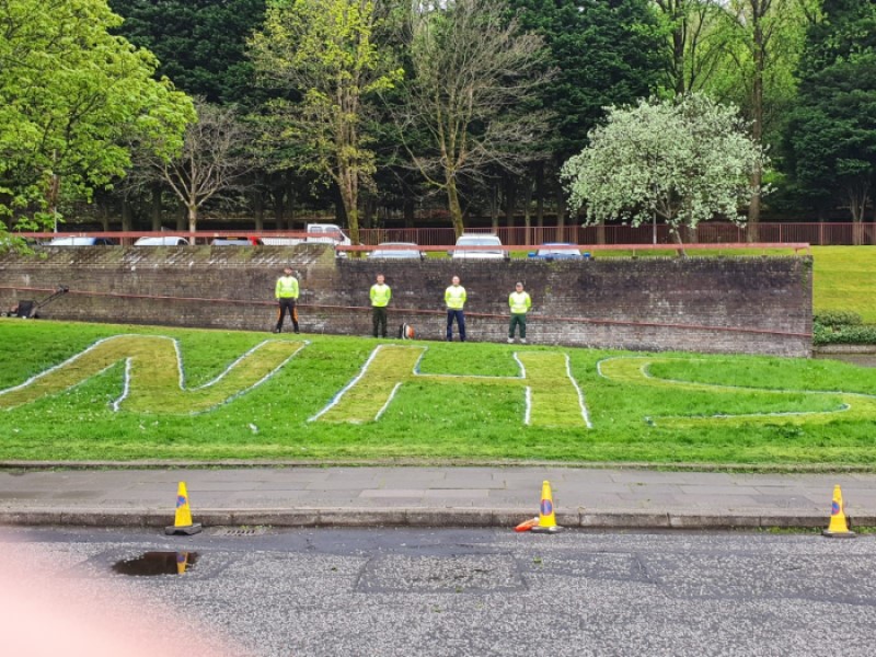 Home Fix Scotland staff pay tribute to NHS outside testing centre