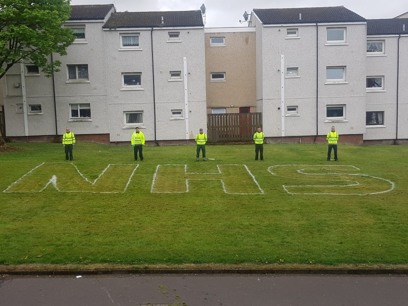 Home Fix Scotland staff pay tribute to NHS outside testing centre