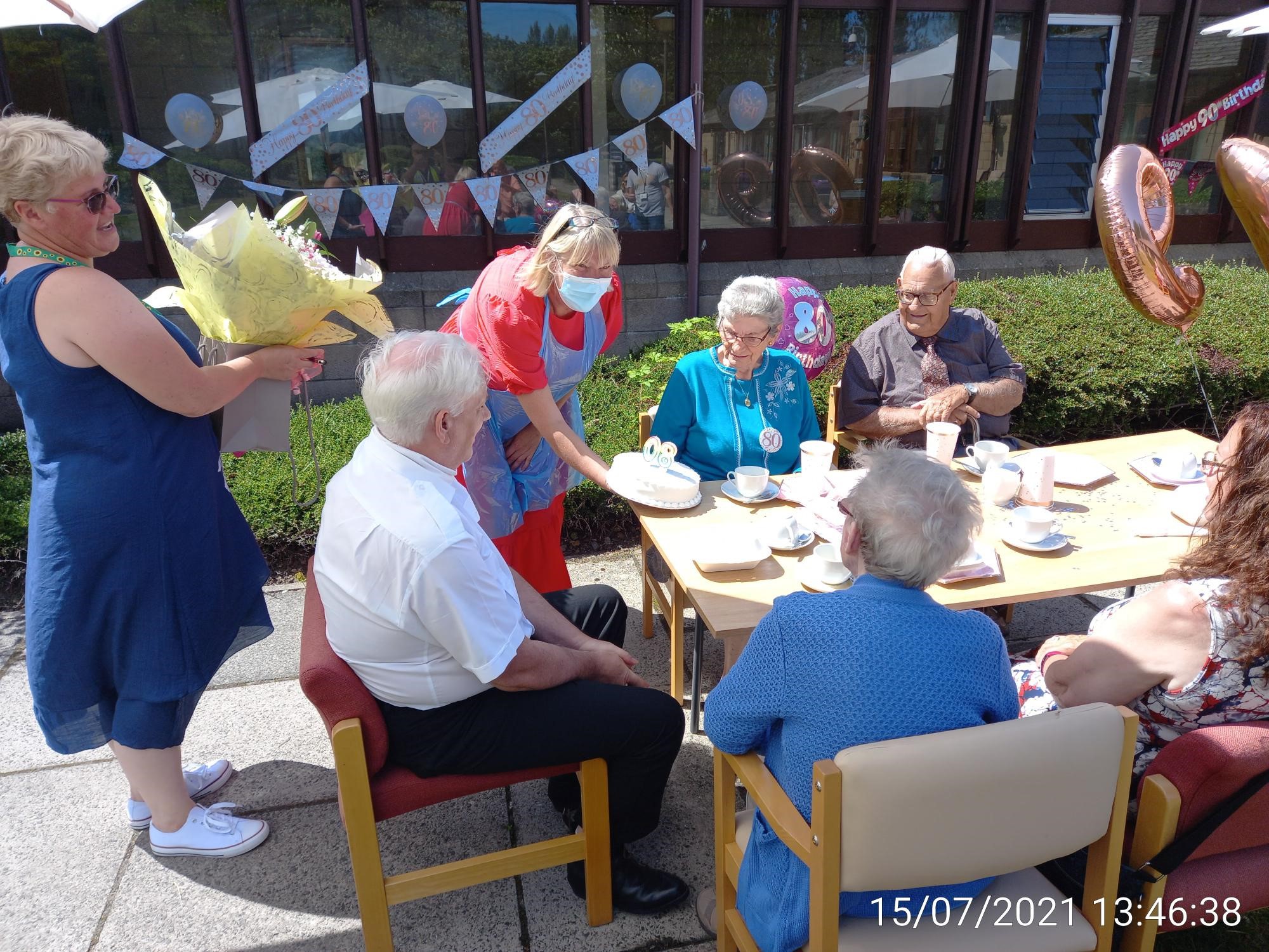 Irvine Housing holds double birthday party at Hawthorn Place